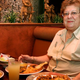 Eileen Rutherford waits to see how her stomach handles the plain naan before taking a second bite.